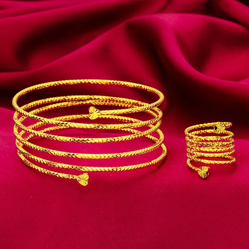 Somptueux ensemble de main oriental ANIID comprenant un bracelet relié à une bague réglable, motif fleur en spirale plaqué or 24 carats pour mariée - Collection 