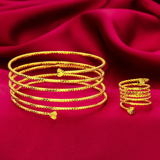 Somptueux ensemble de main oriental ANIID comprenant un bracelet relié à une bague réglable, motif fleur en spirale plaqué or 24 carats pour mariée - Collection 
