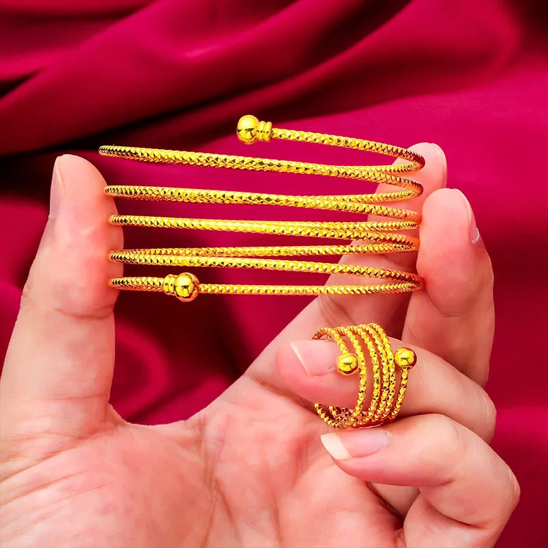 Somptueux ensemble de main oriental ANIID comprenant un bracelet relié à une bague réglable, motif fleur en spirale plaqué or 24 carats pour mariée - Collection TOUT PROMESSE.