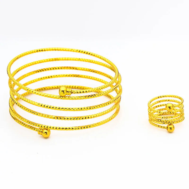 Somptueux ensemble de main oriental ANIID comprenant un bracelet relié à une bague réglable, motif fleur en spirale plaqué or 24 carats pour mariée - Collection TOUT PROMESSE.