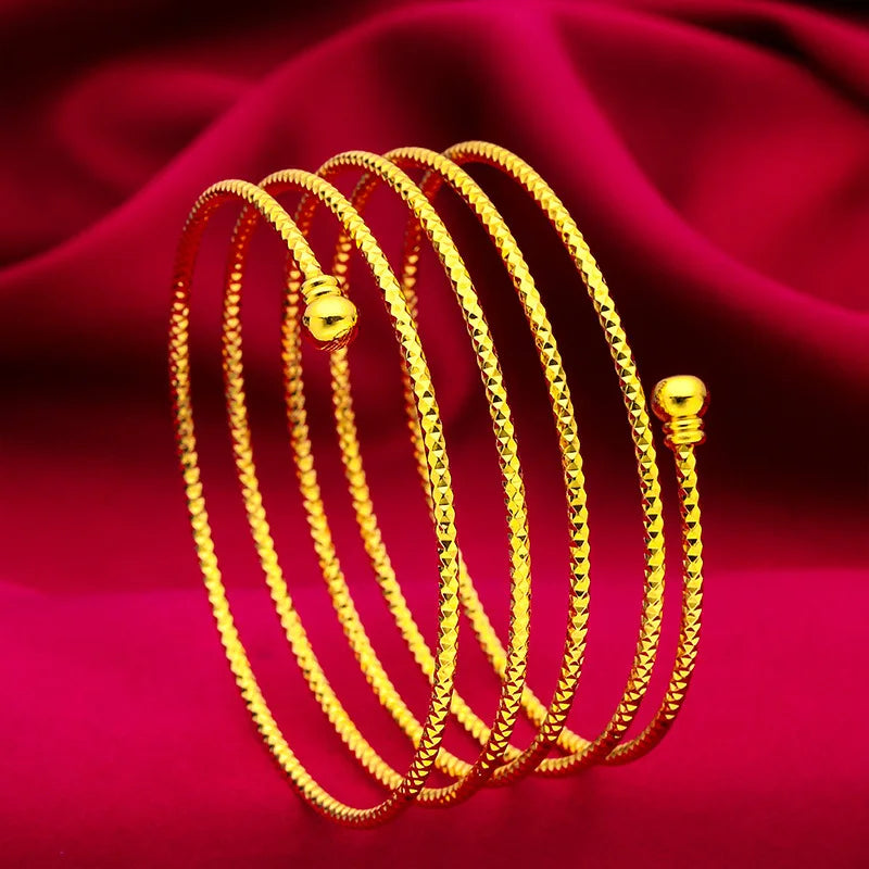 Somptueux ensemble de main oriental ANIID comprenant un bracelet relié à une bague réglable, motif fleur en spirale plaqué or 24 carats pour mariée - Collection TOUT PROMESSE.
