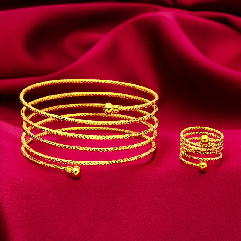 Somptueux ensemble de main oriental ANIID comprenant un bracelet relié à une bague réglable, motif fleur en spirale plaqué or 24 carats pour mariée - Collection TOUT PROMESSE.